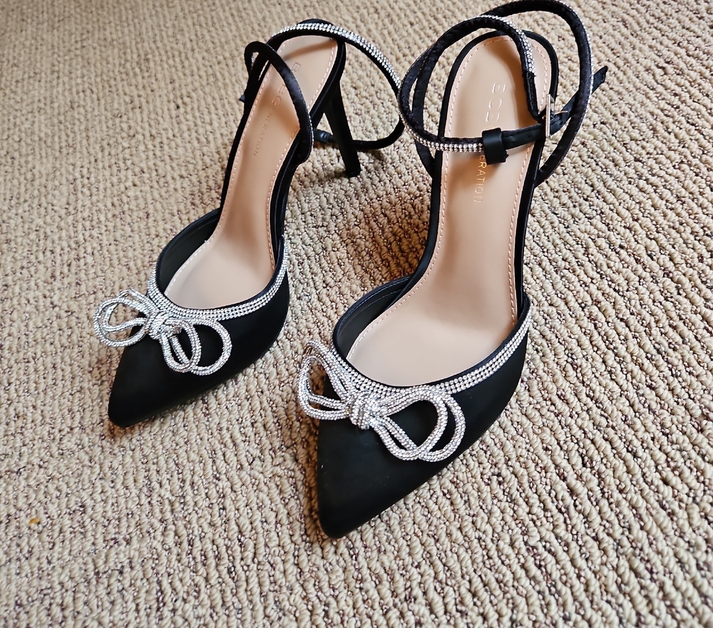 BCBGeneration Black and Silver Heels with Sleek Design